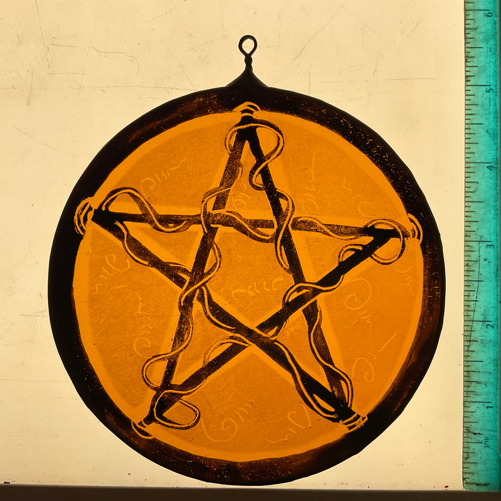 Pentacle stained glass window decoration in amber